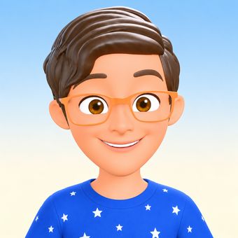 Adam, a smiling boy with brown hair and orange glasses